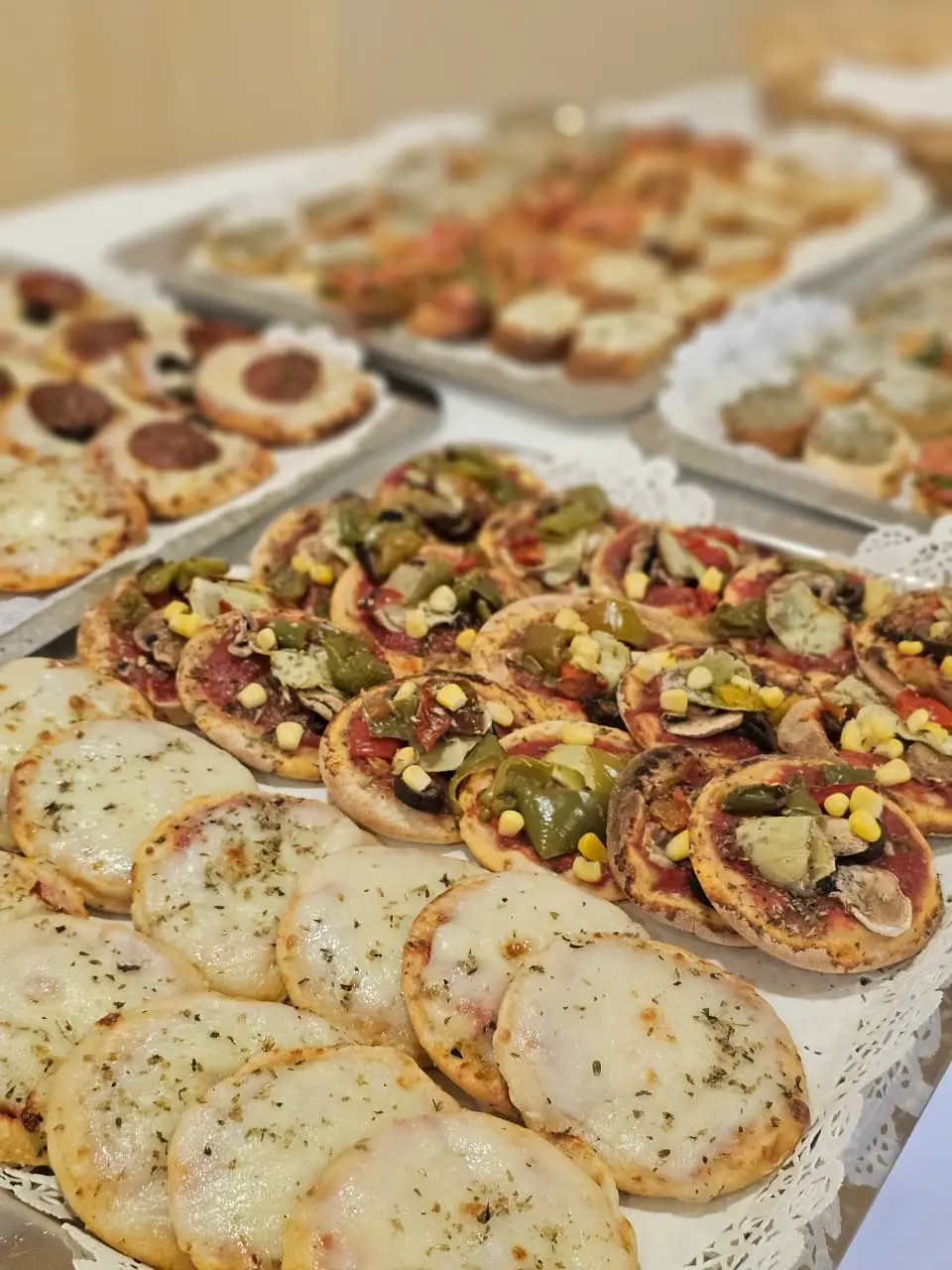 Assorted baked Italian bites on a buffet