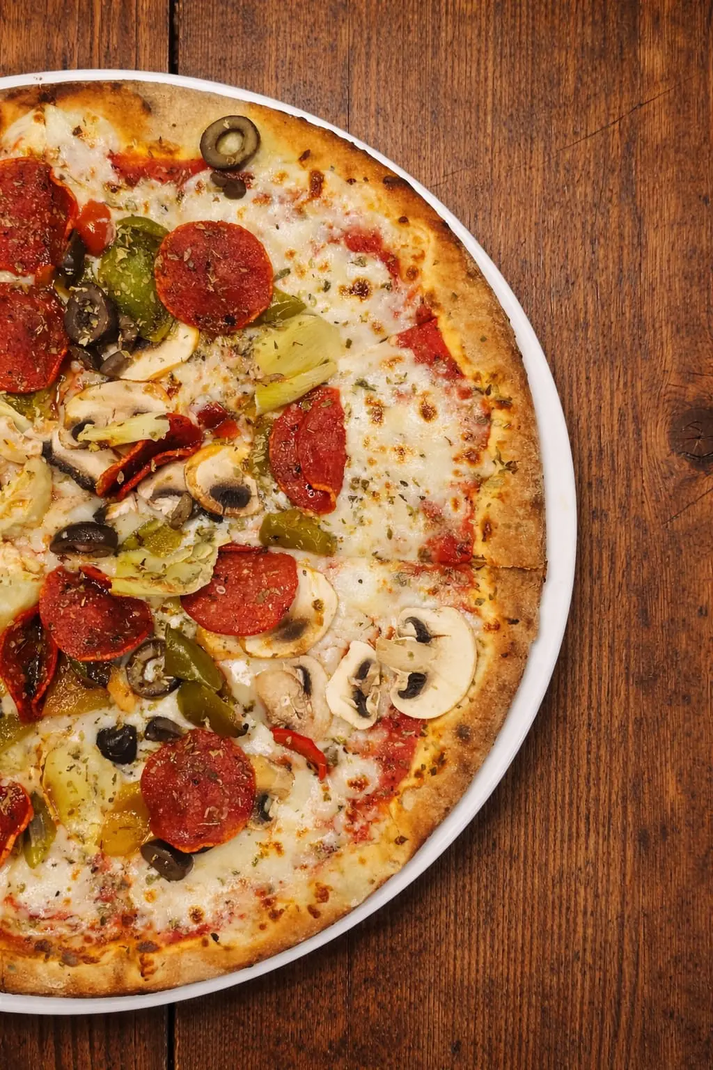 Olivo pizza with pepperoni, vegetables and olives